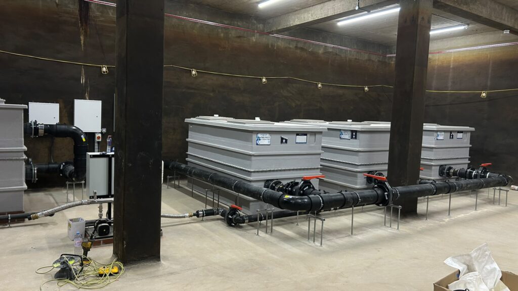 HDPE pipework connected to large rainwater storage tanks in London